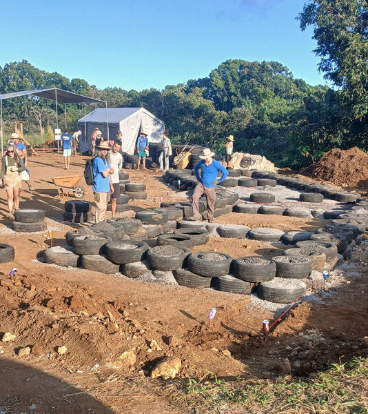 Mike Clark at an earthship build at Rainbow Bridge, Hawaii — where he met Migz